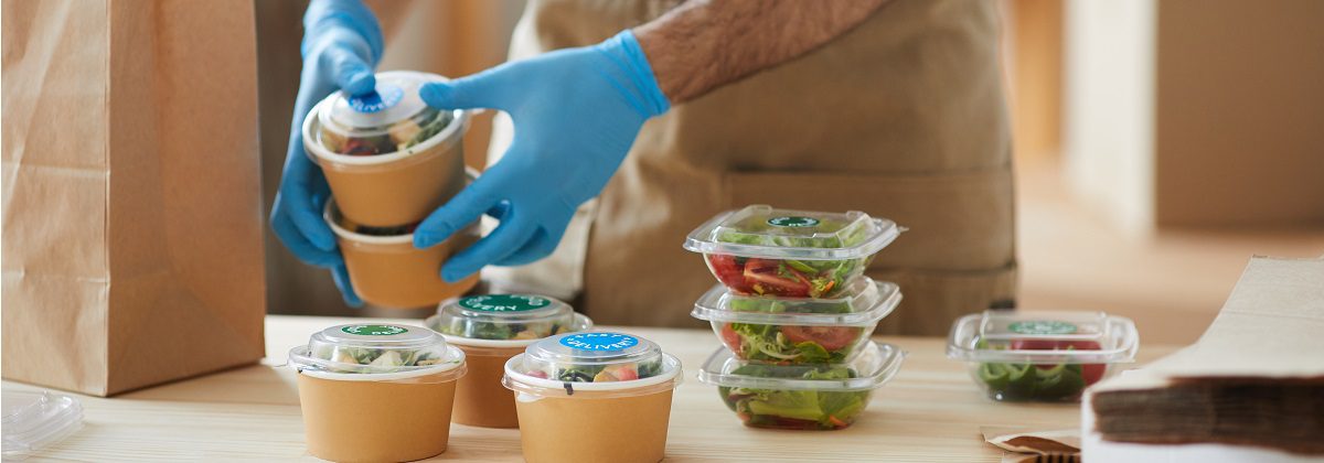 worker-wearing-gloves-at-food-delivery-service-2